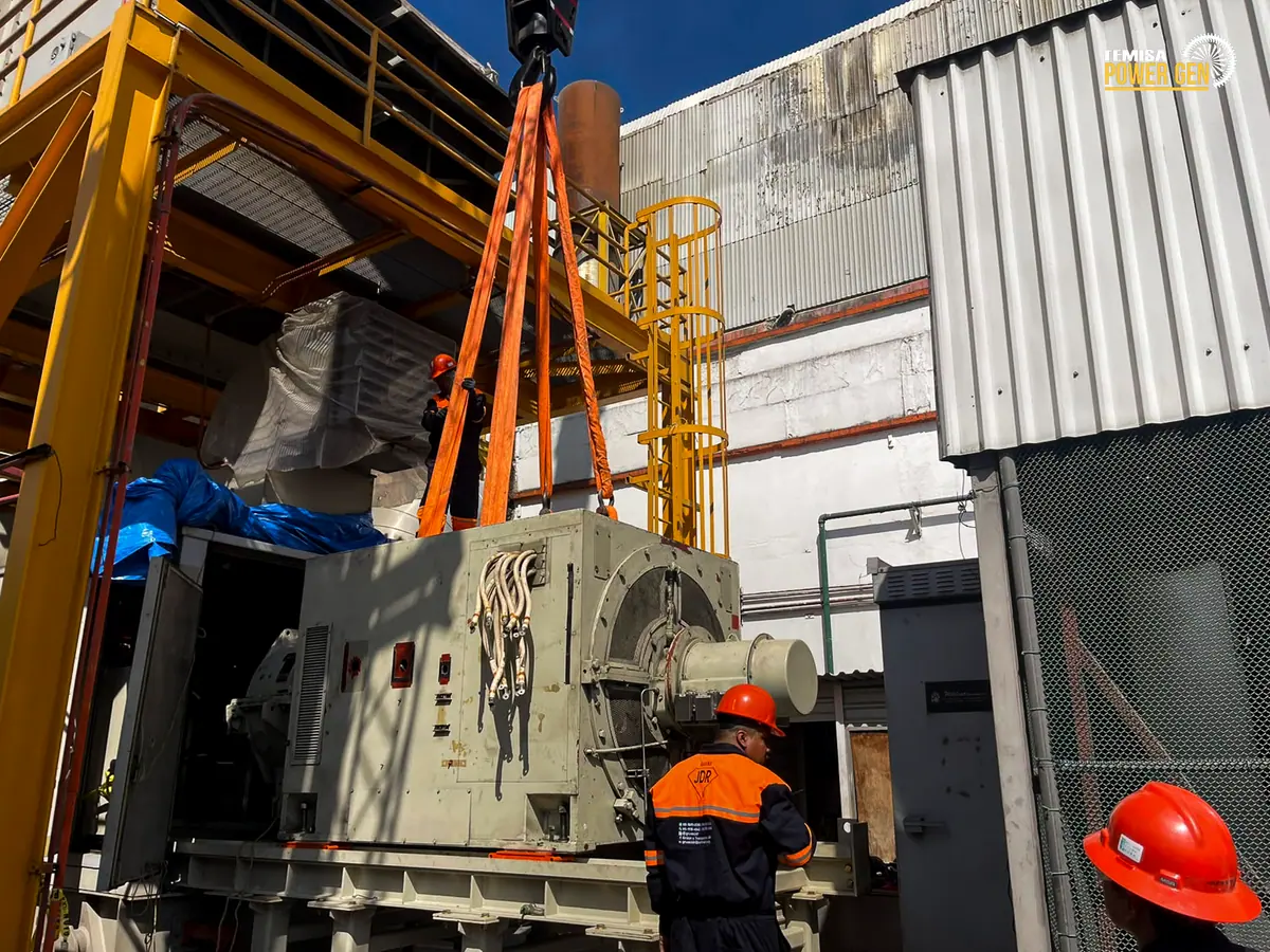 Generator on an auxiliary steel frame with handling equipment around it.